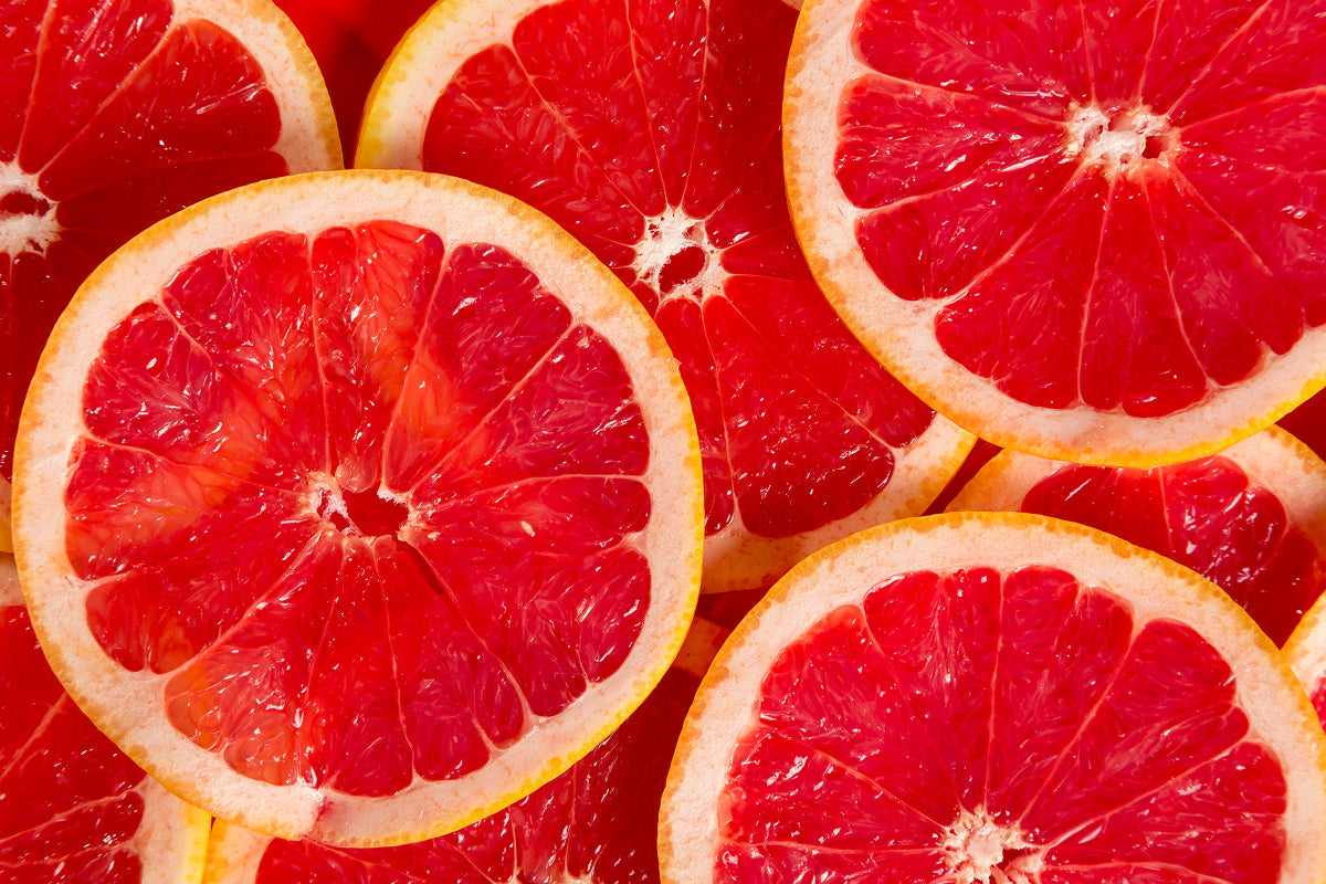 Round slices of red grapefruit