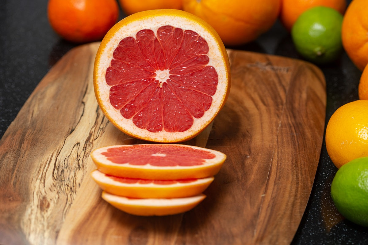 A grapefruit in slices
